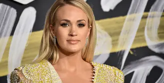 Carrie Underwood menceritakan kisah pilu mengenai kehamilan anak keduanya dalam sebuah wawancara. (MIKE COPPOLA / GETTY IMAGES NORTH AMERICA / AFP)