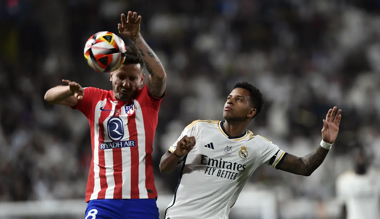 Real Madrid sukses membungkam Atletico Madrid dengan skor 5-3 lewat babak extra time. (AP Photo)