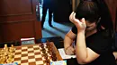 Ketegangan pemain catur remaja bersiap sebelum mengikuti Kejuaraan Catur Remaja Dunia 2017-FIDE di Montevideo (25/9). (AFP Photo/Panta Astiazaran)