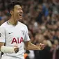 Pemain Tottenham Hotspur, Son Heung-Min merayakan golnya ke gawang Dortmund pada laga grup H Liga Champions di Wembley stadium,  London, (13/9/2017). Tottenham menang 3-1. (Nick Potts/PA via AP)