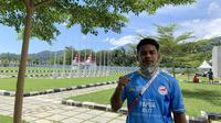 La Ode Nurdiansah Amir Jaya Mahdi, atlet esports tertua di ekshibisi PON XX Papua 2021. (Liputan6.com/ Yuslianson)