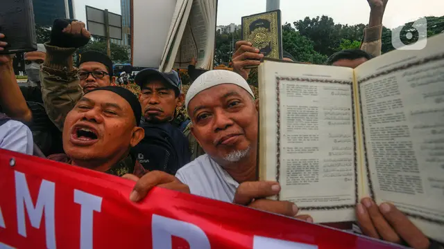 Aksi Mengutuk Pembakaran Alquran
