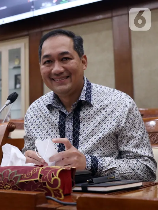 Menteri Perdagangan Muhammad Lutfi saat rapat kerja dengan Komisi VI DPR di Kompleks Parlemen, Jakarta, Kamis (17/3/2022). Dalam rapat tersebut Muhammad Lutfi menyampaikan penjelasan terkait minyak goreng serta dihapusnya Harga Eceran Tertinggi (HET). (Liputan6.com/Angga Yuniar)