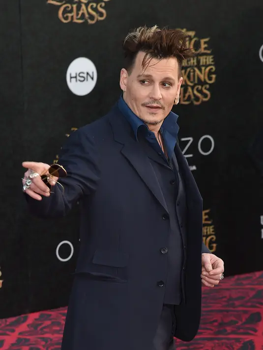 Aktor Johnny Depp di nyatakan dalam kondisi emosional tinggi dan berantakan bahkan depresi usai kasus perceraiannya dengan Amber Heard. (AFP/Bintang.com)