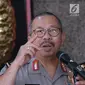 Kadiv Humas Mabes Polri, Irjen Setyo Wasisto memberi keterangan terkait kunjungan Ketua Dewan Pengarah BPIP Megawati Soekarnoputri di Mabes Polri, Jakarta, Rabu (21/3). Kedatangan Megawati adalah bagian dari silaturahmi. (Liputan6.com/Helmi Fithriansyah)