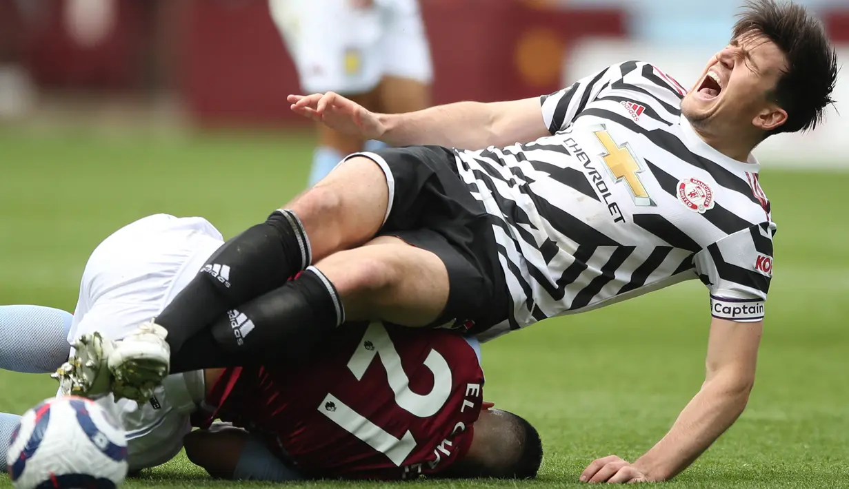 Begitu juga dengan Harry Maguire, hingga dirinya dilanggar keras oleh Anwar El Ghazi dan tidak dapat melanjutkan pertandingan dikarenakan cedera. (Foto: AFP/Pool/Nick Potts)