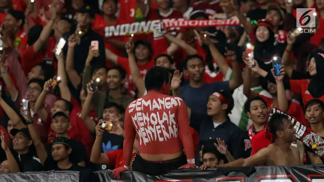 Aksi Suporter Garuda Saat Dukung Timnas Indonesia Melawan Timor Leste