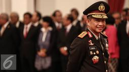 Kapolri yang baru Tito Karnavian memberikan senyum sebelum pelantikan Kapolri di Istana Negara, Jakarta, Rabu (13/7).  Tito Karnavian resmi menjadi Kapolri menggantikan Jenderal Badrodin Haiti. (Liputan6.com/Faizal Fanani)