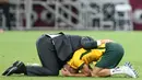 Perjuangan Australia untuk lolos ke Piala Dunia 2022 tidak mudah. Sebab, mereka harus melewati jalur play-off kontinental sebelum mengamankan satu tempat di Qatar. Jalan mereka sangat panjang. (AFP/Mustafa Abumunes)