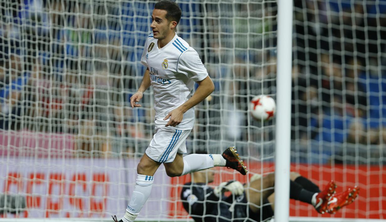 Aksi pemain Real Madrid, Lucas Vazquez usai membobol gawang Numancia pada laga Copa Del Rey di Santiago Bernabeu stadium, Madrid, (10/01/2018). Real Madrid unggul agregat 5-2 atas Numancia. (AP/Francisco Seco)
