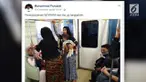 Seeorang pria menjadi pembicaraan warganet karena tidak memberikan kursi untuk seorang ibu yang sedang menggendong anak.