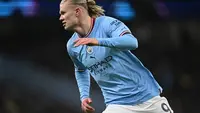 Aksi striker Manchester City, Erling Haaland, pada leg kedua 16 besar Liga Champions kontra RB Leipzig di Stadion Etihad, Manchester, Rabu (15/3/2022) dini hari WIB. (Paul Ellis/AFP)