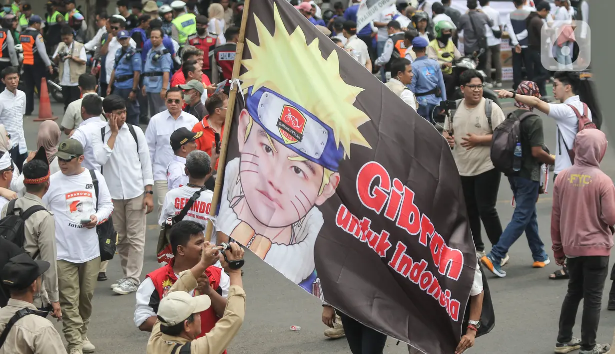 Massa pendukung pasangan ini membludak dan memenuhi jalan. (Liputan6.com/Angga Yuniar)