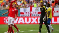 Selebrasi Rooney bersama timnas Inggris (RICHARD HEATHCOTE / GETTY IMAGES NORTH AMERICA / AFP)