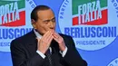 Silvio Berlusconi merupakan salah satu tokoh terkemuka di Italia. Tak hanya aktif di sepak bola, pria kelahiran 29 September 1936 ini juga dikenal sebagai politikus. (AFP/Filippo Monteforte)