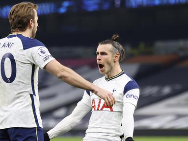 Tottenham Hotspur tampil garang saat menjamu sesama tim asal London, Crystal Palace pada laga Liga Inggris. Dua bomber andalan Jose Mourinho yakni Gareth Bale dan Harry Kane jadi bintang di laga tersebut. (Julian Finney/Pool via AP)