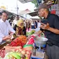 Presiden Jokowi mengunjungi Pasar Rogojampi, Kabupaten Banyuwangi, Provinsi Jawa Timur, Rabu (27/12/2023). (Foto: Muchlis Jr - Biro Pers Sekretariat Presiden)