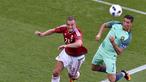 Cristiano Ronaldo mencetak dua gol dan satu assist saat Portugal ditahan Hungaria 3-3, (22/6/2016). (AFP/Jean-Philippe Ksiazek)