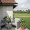 Model Teras Rumah Desa dengan Kursi Cor Minimalis yang Nyaman. (Foto: AI)
