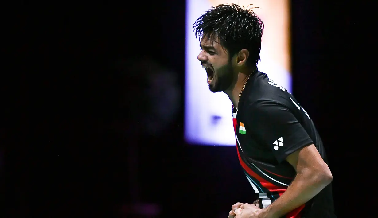 Ekspresi pebulu tangkis India Sai Praneeth Bhamidipati usai mengalahkan wakil Indonesia Jonatan Christie dalam perempat final tunggal putra Kejuaraan Dunia Bulu Tangkis 2019 di St Jakobshalle, Basel, Swiss, Jumat (23/8/2019). Sai menang dua gim langsung 22-24, 14-21. (FABRICE COFFRINI/AFP)