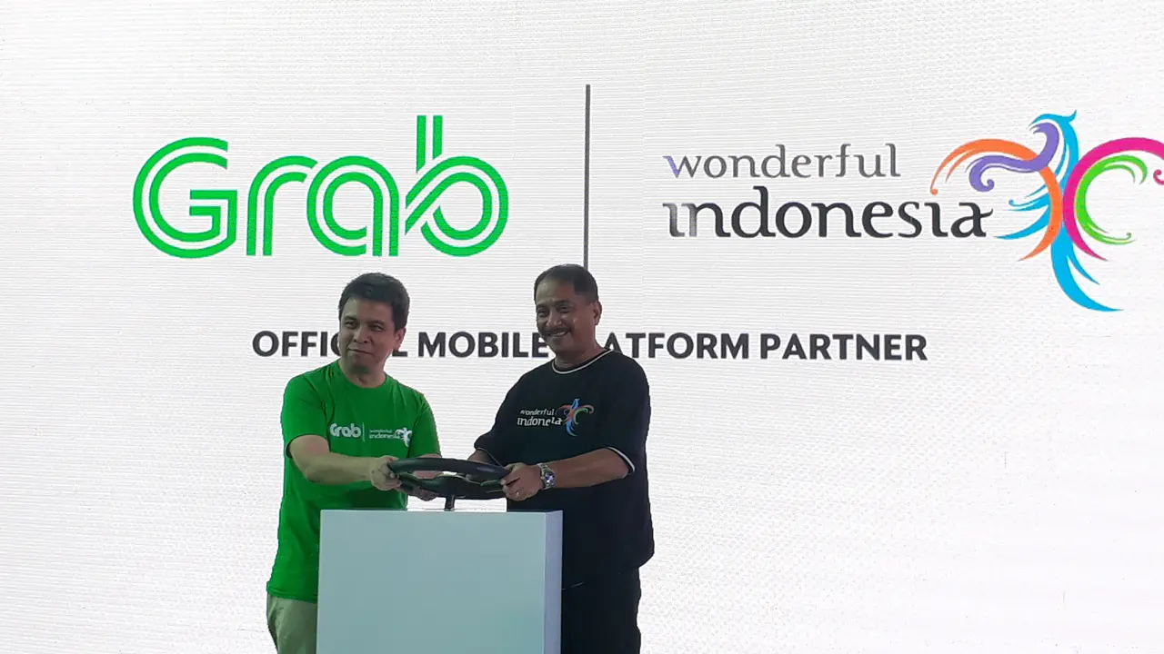 Grab luncurkan kampanye #JelajahIndonesiaLebihDekat dengan menggandeng Kementerian Pariwisata di Terminal 3 Bandara Internasional Soekarno Hatta, Jumat (26/10/2018). (Mita/Liputan6.com)