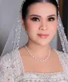 Penampilan sang mempelai perempuan, Chen Giovani di acara pemberkatan nikah mencuri perhatian. [IG/fcgweddings/myrnamyura]