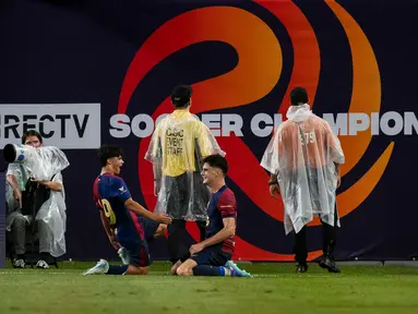 Pemain Barcelona merayakan gol penentu kemenangan pada pertandingan persahabatan pra-musim melawan Real Madrid di MetLife Stadium pada 3 Agustus 2024 atau Minggu (4/8/2024) pagi WIB di East Rutherford, New Jersey. (Ira L. Black/Getty Images North America/Getty Images via AFP)