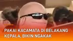 Momen kocak terekam di sebuah gedung pertunjukan. Seorang pria yang memakai kacamata di belakang kepala jadi sorotan. Lantaran sisi belakang kepalanya mirip wajah yang seolah mengawasi penonton.