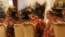 Presiden Joko Widodo atau Jokowi mengundang para tokoh asal Papua dan Papua Barat di Istana Negara, Jakarta, Selasa (10/9/2019). Puluhan tokoh Papua hadir ke Istana kompak mengenakan topi rumbai, begitu juga para menteri yang mendampingi Jokowi. (Liputan6.com/Angga Yuniar)