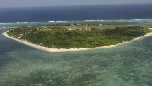 Pulau Pag-asa, bagian dari gugus kepulauan Spratly di Laut China Selatan. Gugus kepulauan Spratly menjadi salah satu lokasi yang kerap dimiliterisasi oleh China (AP Photo/Rolex Dela Pena, Pool, File)