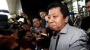 Ketua Umum PPP versi Muktamar Surabaya ini datang ke KPK mengenakan kemeja bergaris warna abu-abu hitam, Jakarta, Rabu (3/12/2014). (Liputan6.com/Miftahul Hayat)