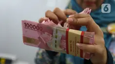 Kurs Rupiah Kembali Dekati 18.000 per Dolar AS