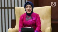 Plt Kepala BPS Amalia Adininggar Widyasanti berpose usai wawancara dengan Liputan6.com di Kantor BPS, Jakarta, Rabu (13/12/2023). (Liputan6.com/Herman Zakharia)