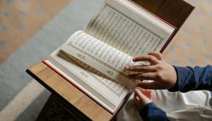 ilustrasi membaca quran (Image Bank Liputan6)