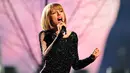 Petembang lagu 'Wildest Dream' tersebut mengaku bahwa ia kesal dengan Carrie, dan Taylor memohon agar Carrie tak menganggu kekasihnya lagi. (AFP/Bintang.com)