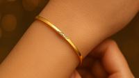 Model Gelang Emas 2 Gram untuk Tangan Berisi (created by AI)