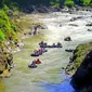 Yang terbaru dari wisata jeram itu adalah paket tubing. (Liputan6.com/Aris Andrianto)