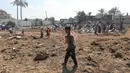 Serangan ini menambah daftar panjang penderitaan warga Gaza, sementara militer Israel bersiap mengerahkan lebih dari 60 ribu tentara cadangan untuk operasi darat. (Eyad BABA/AFP)