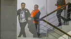 Rektor Universitas Jenderal Soedirman (Unsoed) Akhmad Sodiq berjalan menuju mobil tahanan seusai menjalani pemeriksaan di Gedung Merah Putih KPK, Jakarta, Sabtu, 22 Agustus 2026. KLY/ Arie Basuki)