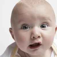 Begini wajah bocah yang terbangun karena kaget.