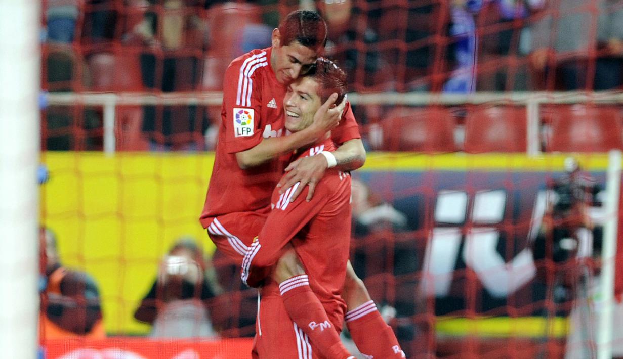 Angel Di Maria pernah jadi rekan setim Cristiano Ronaldo di Real Madrid. Kombinasi Di Maria dan Ronaldo di sisi serangan Madrid seringkali jadi andalan Los Blancos. (Foto: AFP/Cristina Quicler)