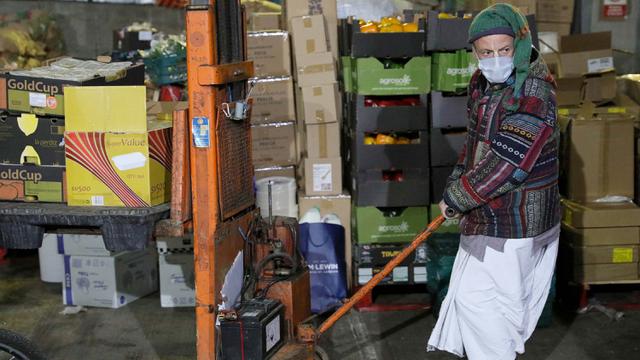 FOTO: Pemerintah Perangi Corona, Badan Amal di Inggris Sediakan Makan Tunawisama