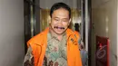 Raja Bonaran Situmeang hanya tersenyum usai menjalani sidang lanjutan di Pengadilan Tipikor, Jakarta, Senin (16/3/2015). Majelis hakim menolak nota keberatan (eksepsi) Bonaran atas dakwaan Jaksa KPK. (Liputan6.com/Helmi Afandi)