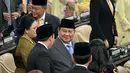 Presiden Indonesia Prabowo Subianto saat tiba menghadiri Sidang Tahunan MPR RI dan Sidang bersama DPR dan DPD RI tahun 2026 di Gedung Nusantara, Kompleks Parlemen, Senayan, Jakarta, Jumat, 14 Agustus 2026. (AFP/ Bay Ismoyo)