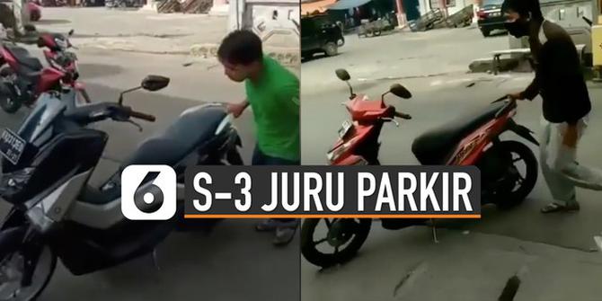 VIDEO: Viral Pria Unjuk Kebolehan Parkir Motor Dengan Satu Tangan
