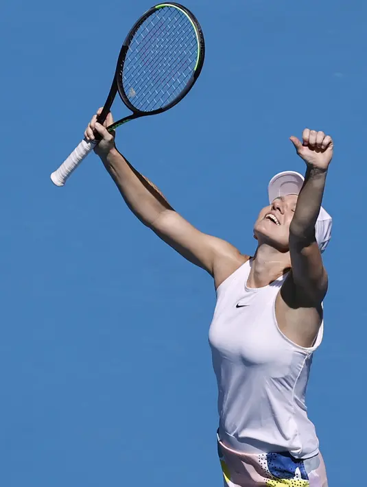 Petenis Rumania, Simona Halep berselebrasi setelah mengalahkan Anett Kontaveit dari Estonia pada perempat final  kejuaraan tenis Australia Terbuka di Melbourne (29/1/2020). Simona Halep menang 6-1, 6-1 atas Anett Kontaveit dan lolos ke babak semifinal Australia Terbuka. (AP Photo/Dita Alangkara)