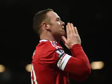 Ekspresi Wayne Rooney setelah Manchester United menang atas Stoke City 3-0 dalam lanjutan Liga Inggris di Stadion Old Trafford, Manchester, Rabu (3/2/2016) dini hari WIB. (AFP/Paul Ellis)