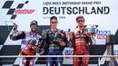 Posisi kedua diraih oleh Johann Zarco (kiri) dan diikuti Jack Miller (kanan) di posisi ketiga. (AFP/Ronny Hartmann)
