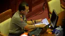 Komjen Pol Budi Gunawan saat bersiap menjalani uji kelayakan dan kepatutan di ruang Komisi III DPR RI, Senayan, Jakarta, Rabu (14/1/2015). (Liputan6.com/Faisal R Syam)