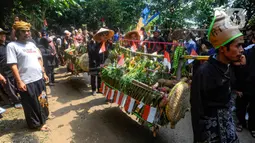 Tradisi budaya sedekah bumi yang sudah vakum selama bertahun-tahun dihidupkan kembali oleh warga Lembur Sawah. (merdeka.com/Arie Basuki)